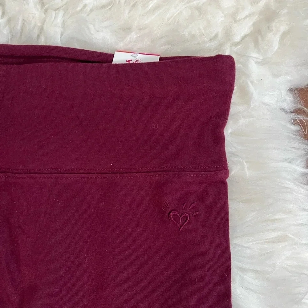 Justice burgandy leggings Size 18/20